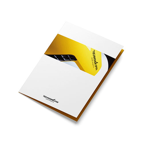 Brochure TechnoAlpin avec couverture jaune et blanche et logo